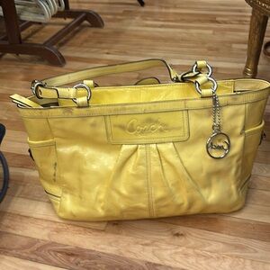 Coach Well Used Yellow Patent Leather Has Stains. Very Loved